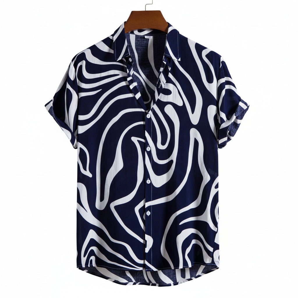 Navy and white patterned shirt on a hanger with a white background